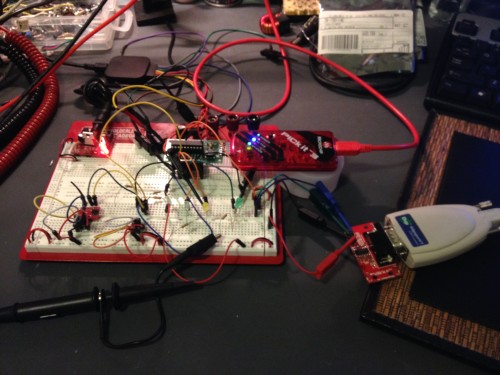 The circuit... TCN75 on the bottom left of the breadboard. The PIC microcontroller is the think the PICKit3 is plugged into and I'm dumping the raw data to RS-232 (bottom right).