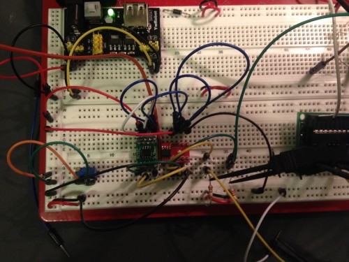 The TCN75A boards are back to back with the K type probe between them. To the bottom right you see the I2C pull up resistors with the logic analyzer tied to them. The PIC16F1509 is just to the right.